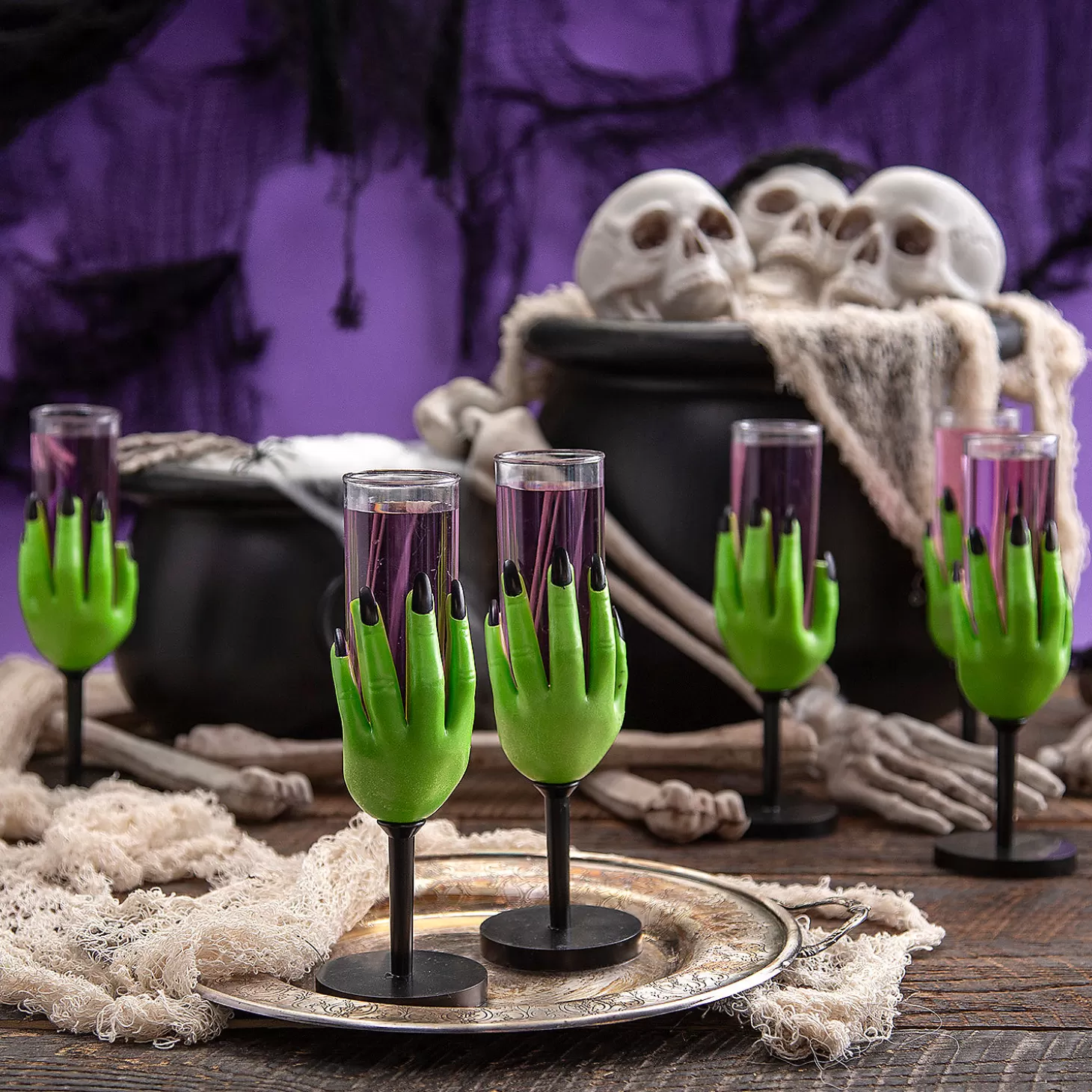 Online 2 Oz. Witch Hand Plastic Glasses - 12 Ct. Tableware